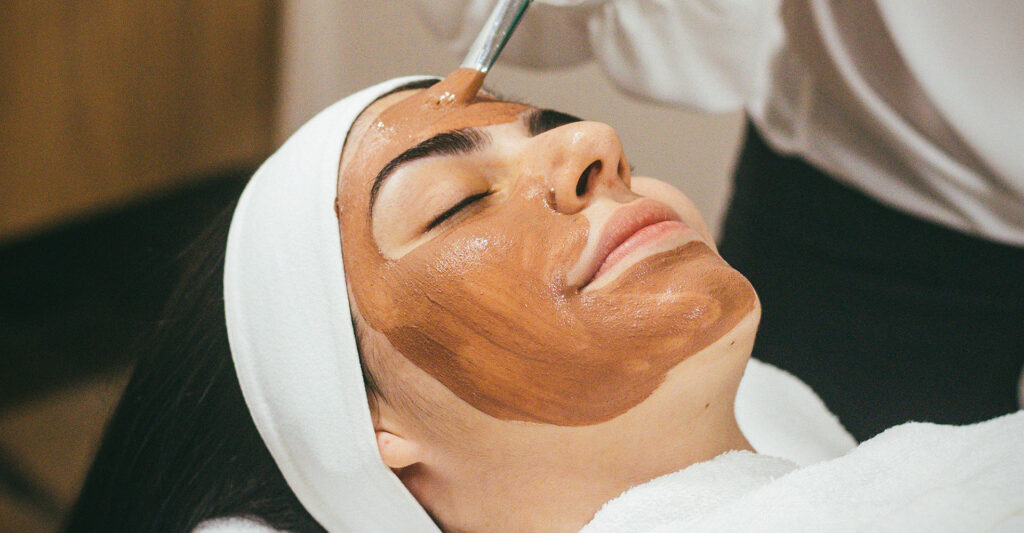 woman receiving professional facial