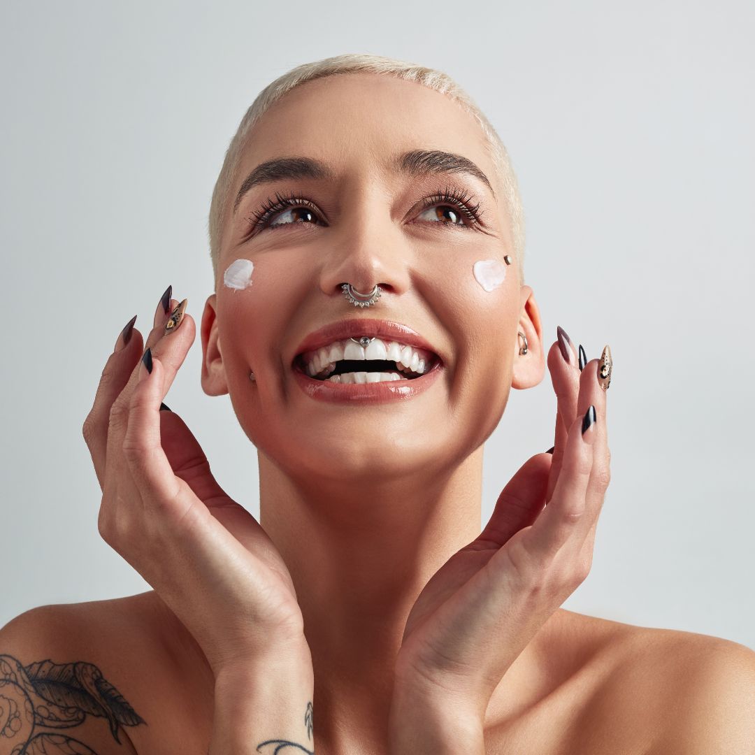 Woman with piercings smiling