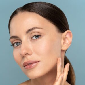 Woman touching face