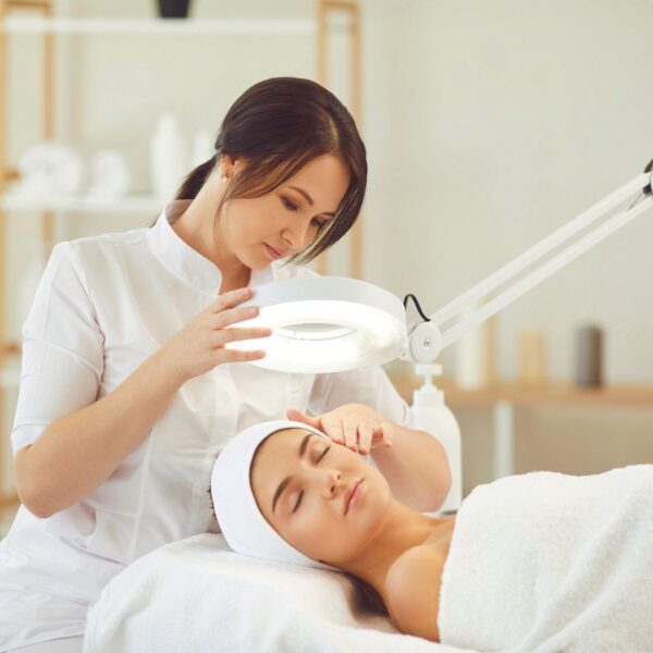 A woman getting an appointment with a beauty professional