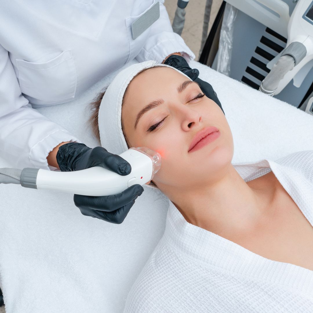 Skincare specialist performing a skincare treatment