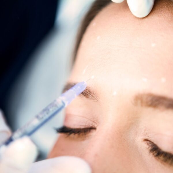 Skincare specialist performing Botox injections