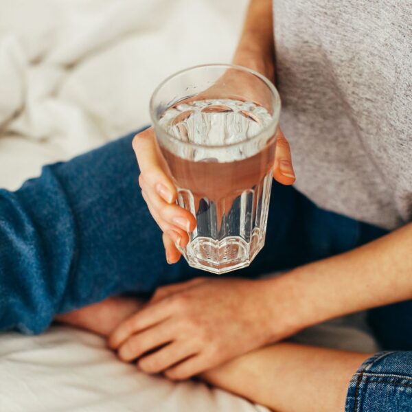 Woma drinking water.