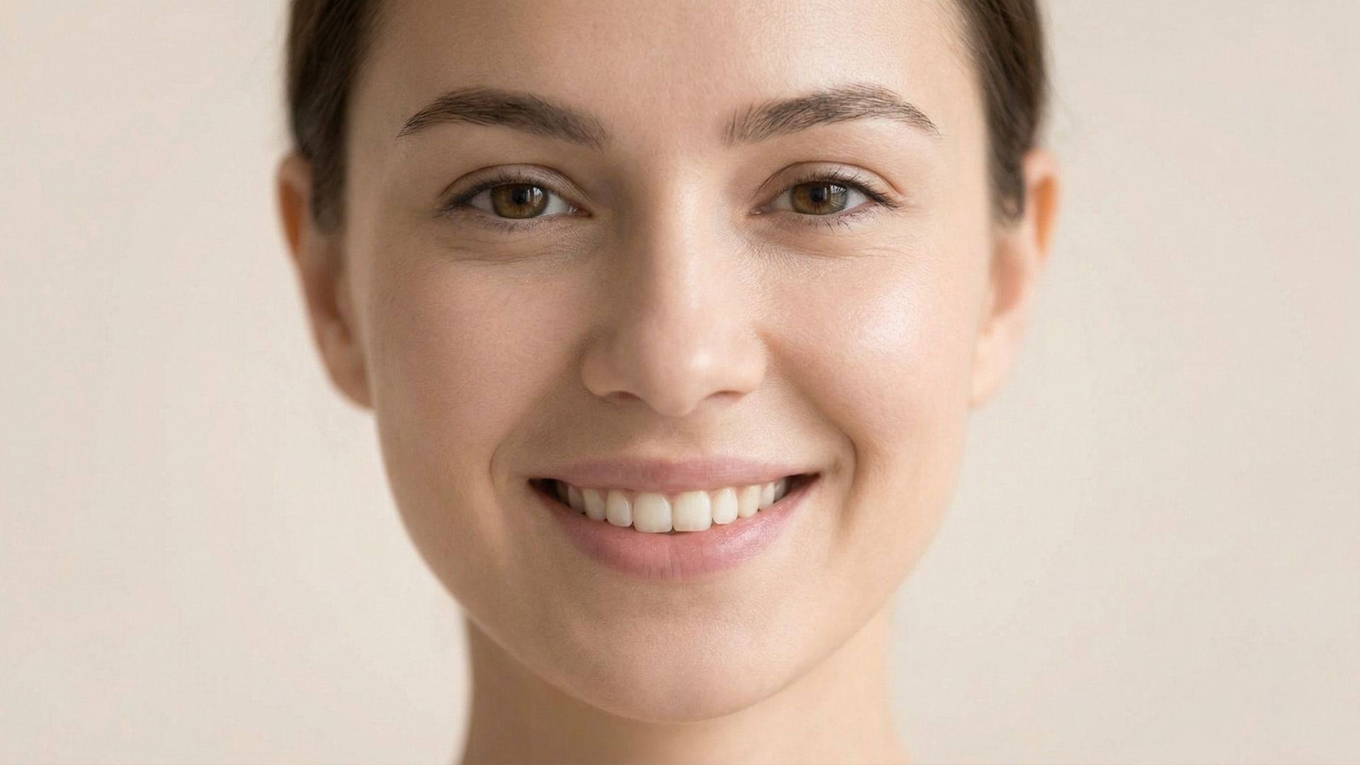 4 Ways Tamjidi Skin Institute Can Help You Look and Feel Your Best Feature A soft, natural close-up photograph of a woman smiling with clear skin and a radiant glow.